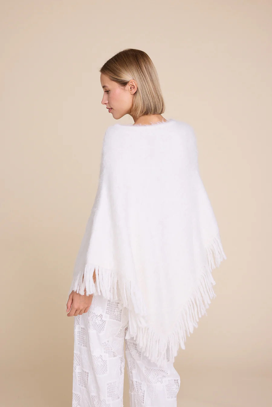 KNITTED PONCHO CREME